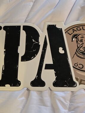 Large Black Lettered Sign with Dog Logo